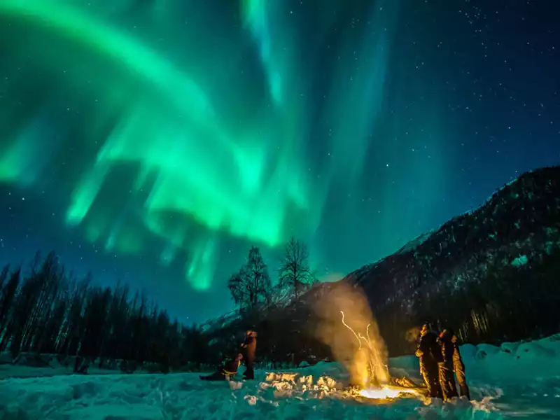 Alaska Northern Lights Train | Aurora, Ice Fishing and Dog Sledding